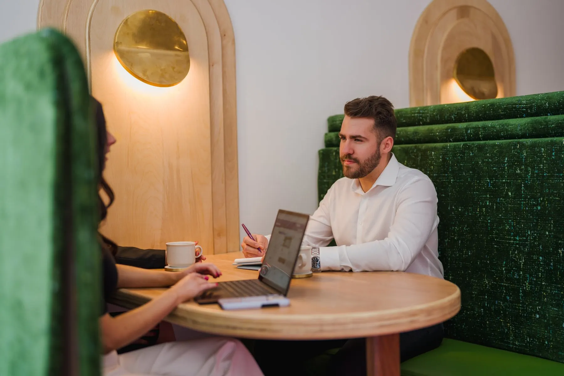 Matthew Farrahar meeting with clients